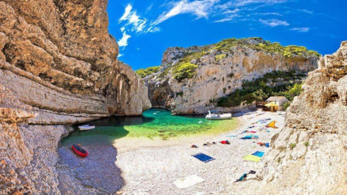 Stiniva Cove on Vis Island, Croatia – Boat tour destination with crystal-clear waters